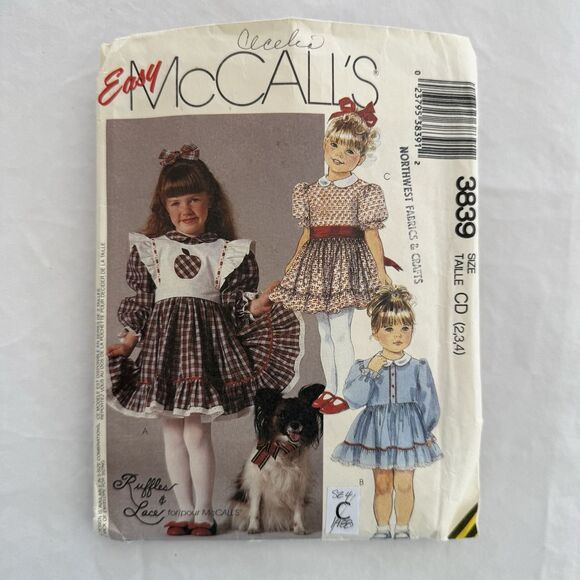 Vtg McCalls EASY Sewing Pattern 3839 Toddler Ruffled Dress Detachable Bib Sz 2-4 - Picture 1 of 3